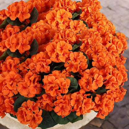 Hananona 12 Pcs Artificial Geranium Flowers for Outdoors Geranium Silk Orange Flower Outdoor UV Resistant Patio Plants Faux Autumn Flowers for Fall Home Kitchen Table Centerpieces (12, Orange)